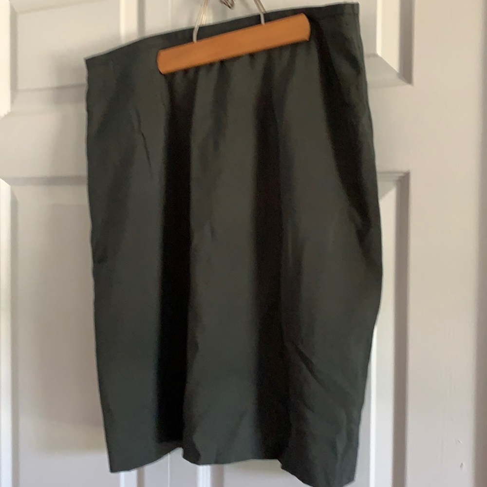 Dark green skirt.